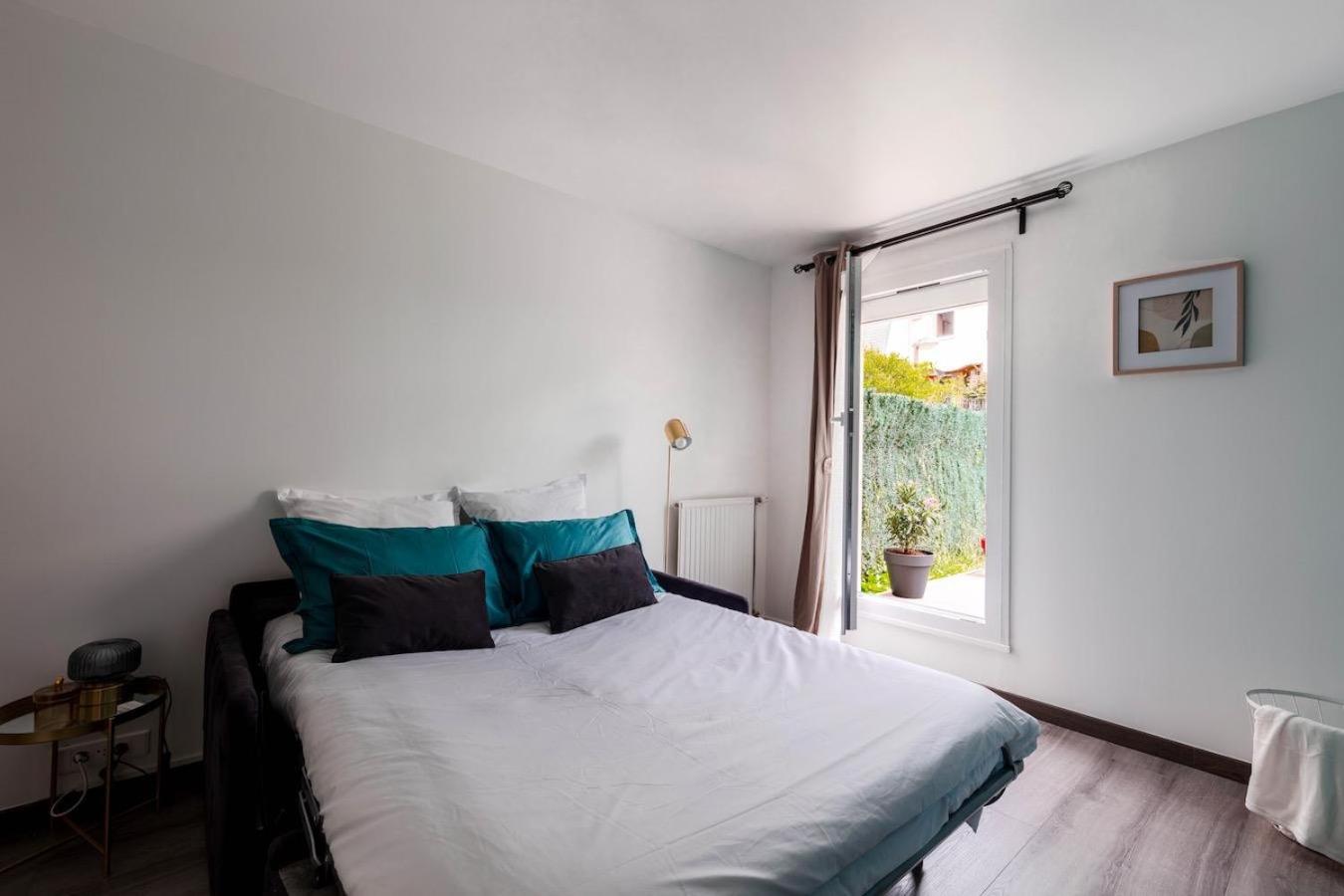 Charmant refuge avec jardin, à 6 minutes à pied du métro Créteil L Échat-Lovely retreat with garden, located a 6-minute walk from Créteil L Échat metro station