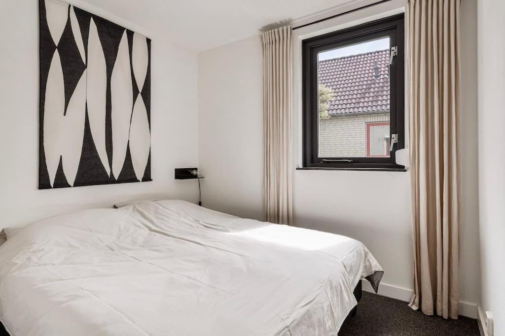 Vakantiehuis aan het water -incl laadpaal-