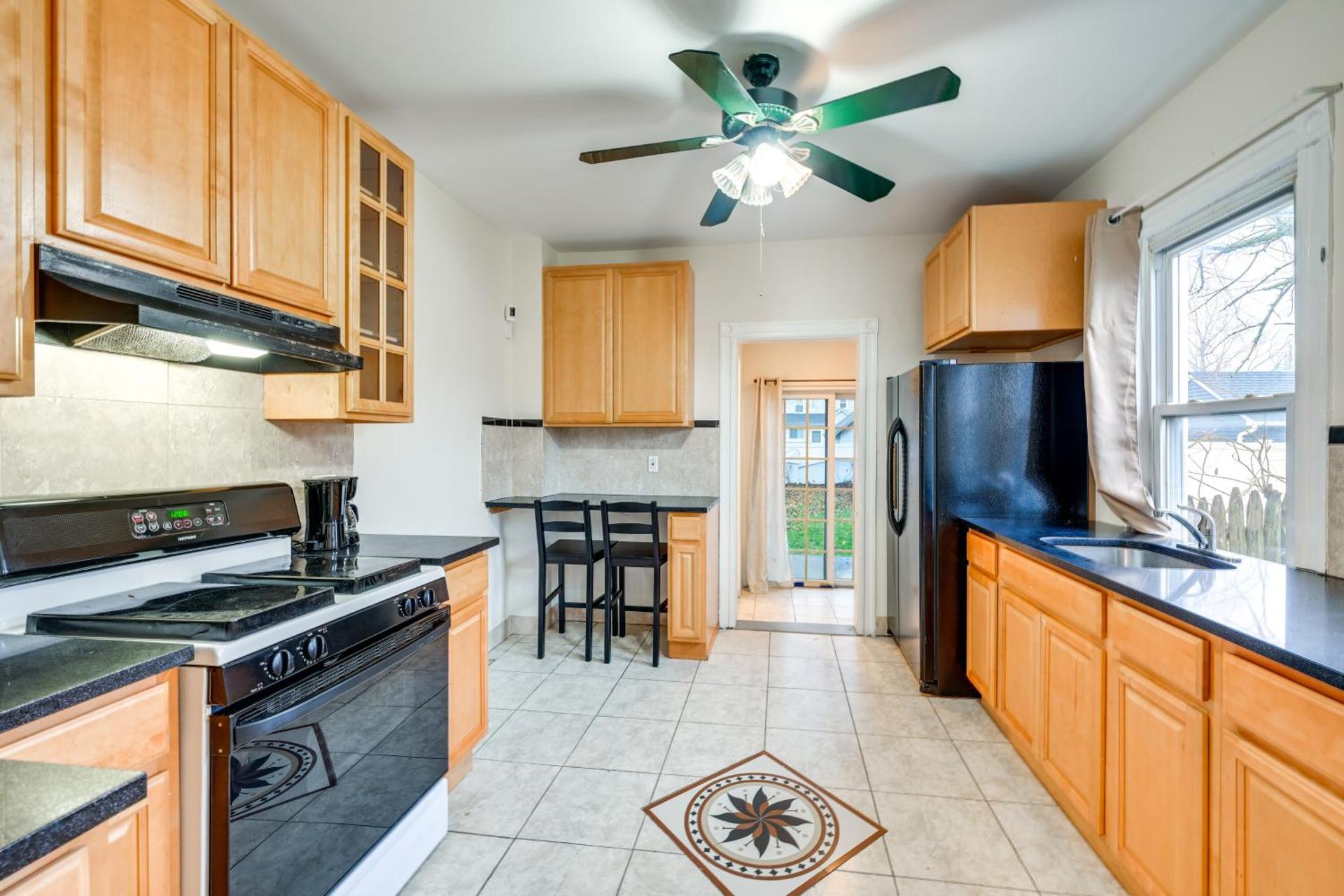 Charming Long Island Home with Fenced Yard!