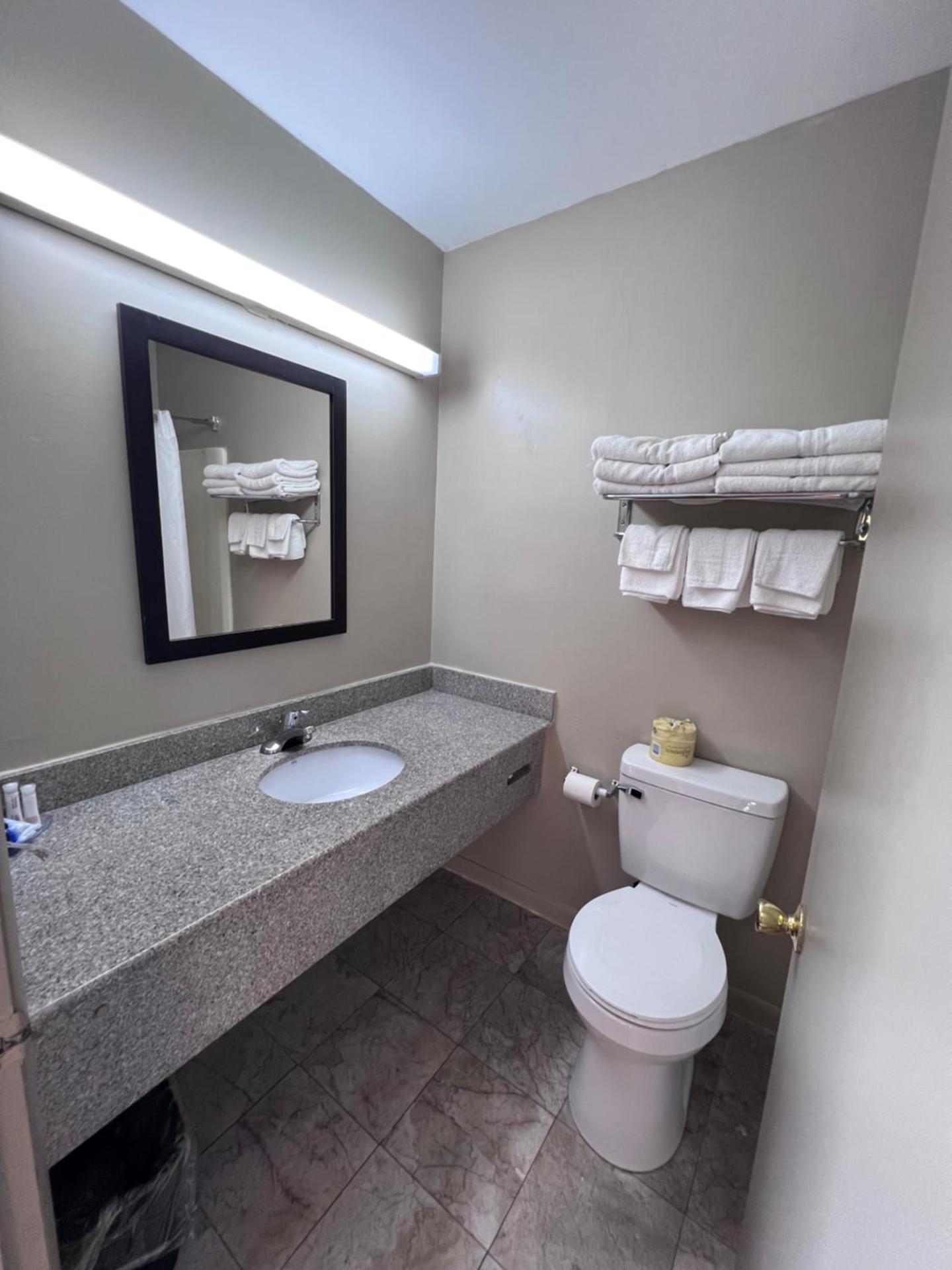 Queen Suite with Two Queen Beds and One Double Bed - Non Smoking