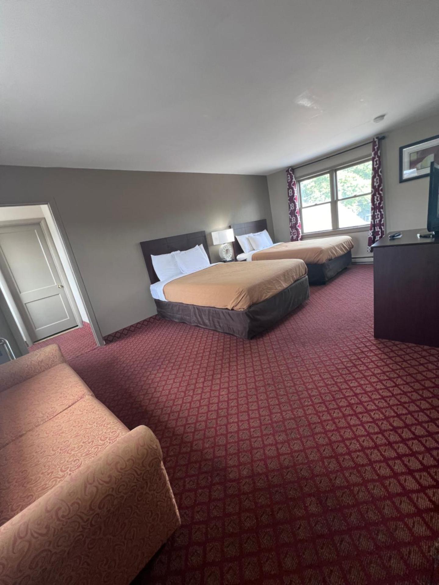 King Suite with One King Bed and Two Double Beds - Non Smoking