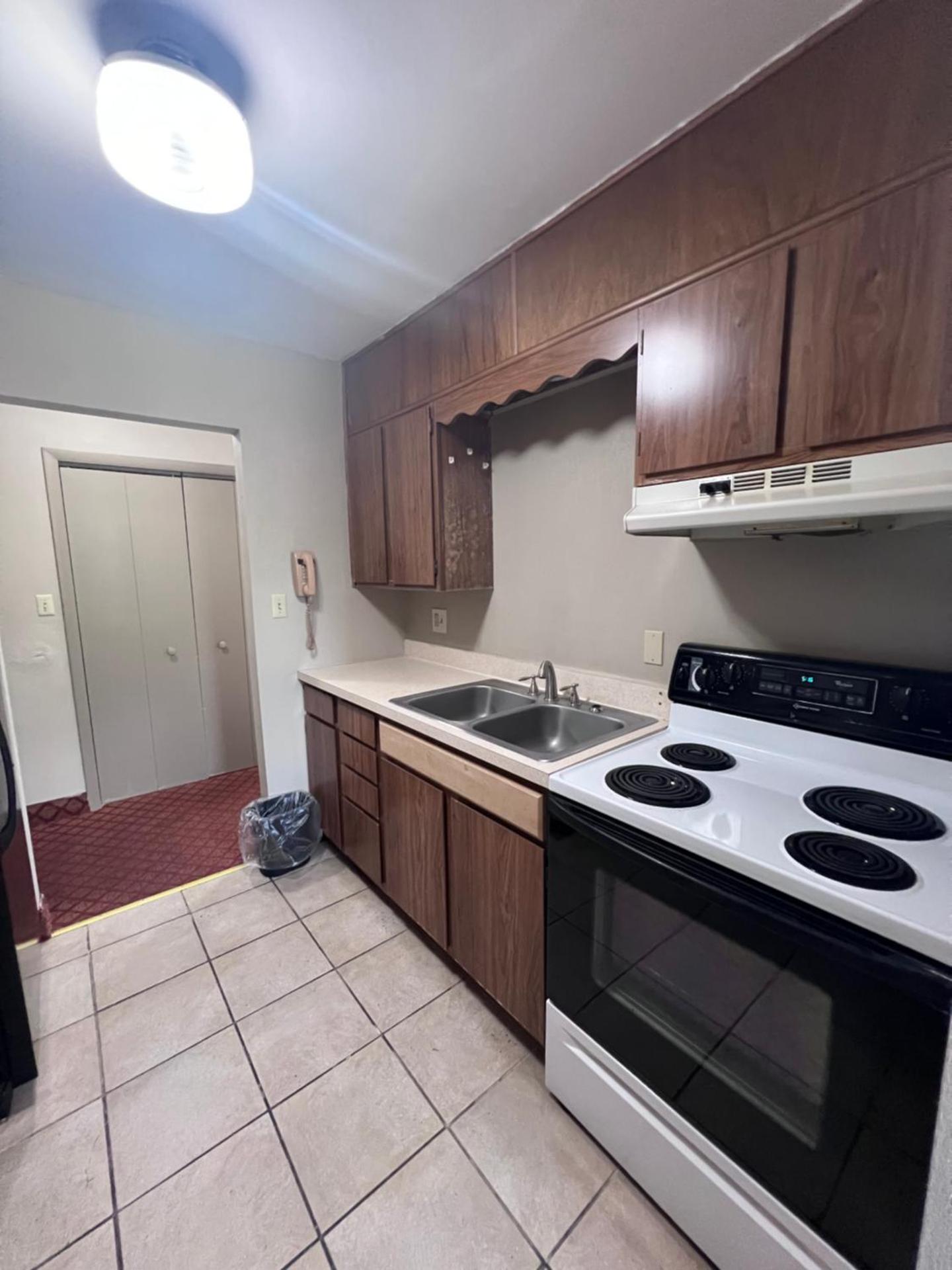 King Suite with One King Bed and Two Double Beds - Non Smoking