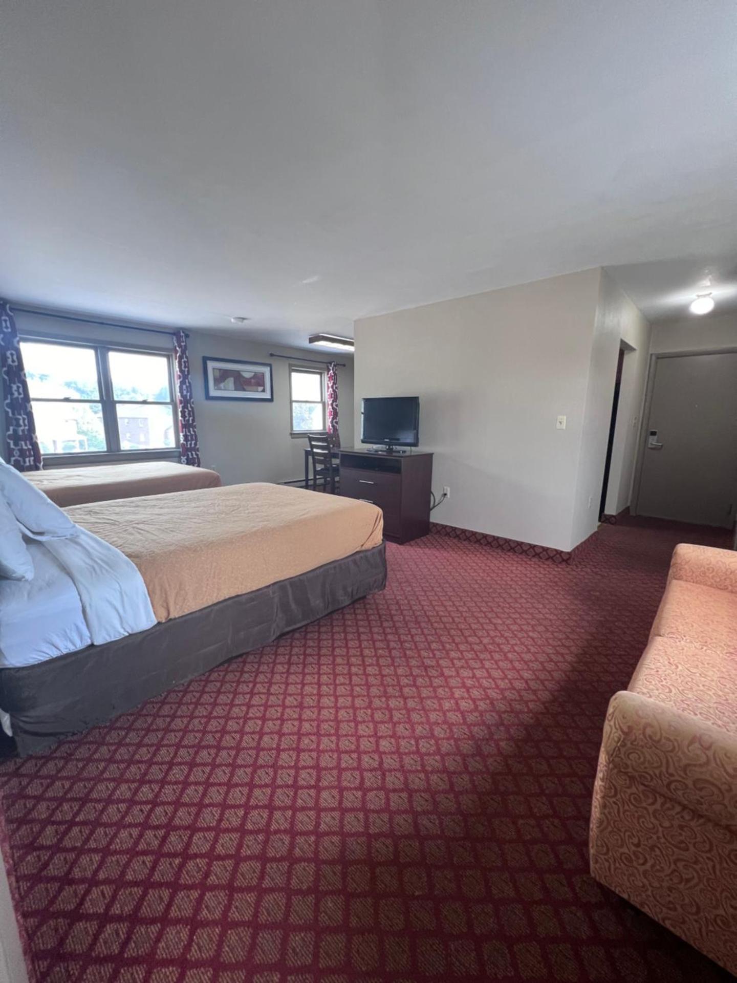 King Suite with One King Bed and Two Double Beds - Non Smoking