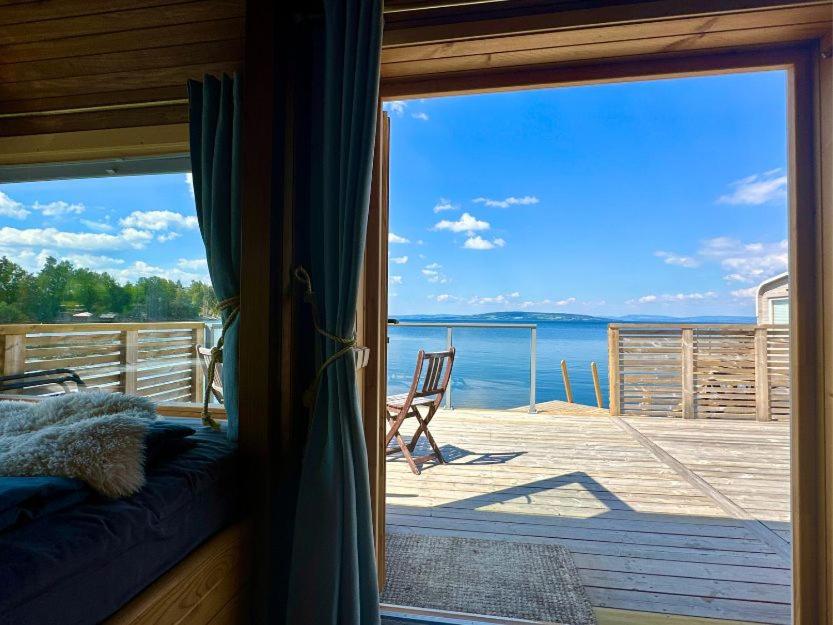 Idylliske Evjua ved Mjøsa