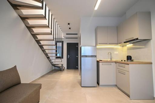 TRES V Suites & Apartments