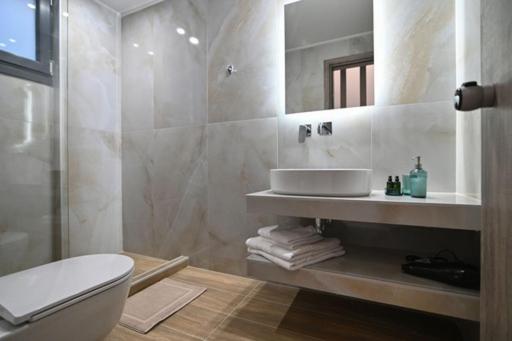 TRES V Suites & Apartments