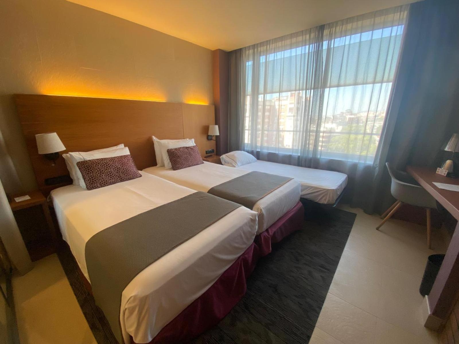 Double or Twin Room with Extra Bed (2 Adults + 1 Child)