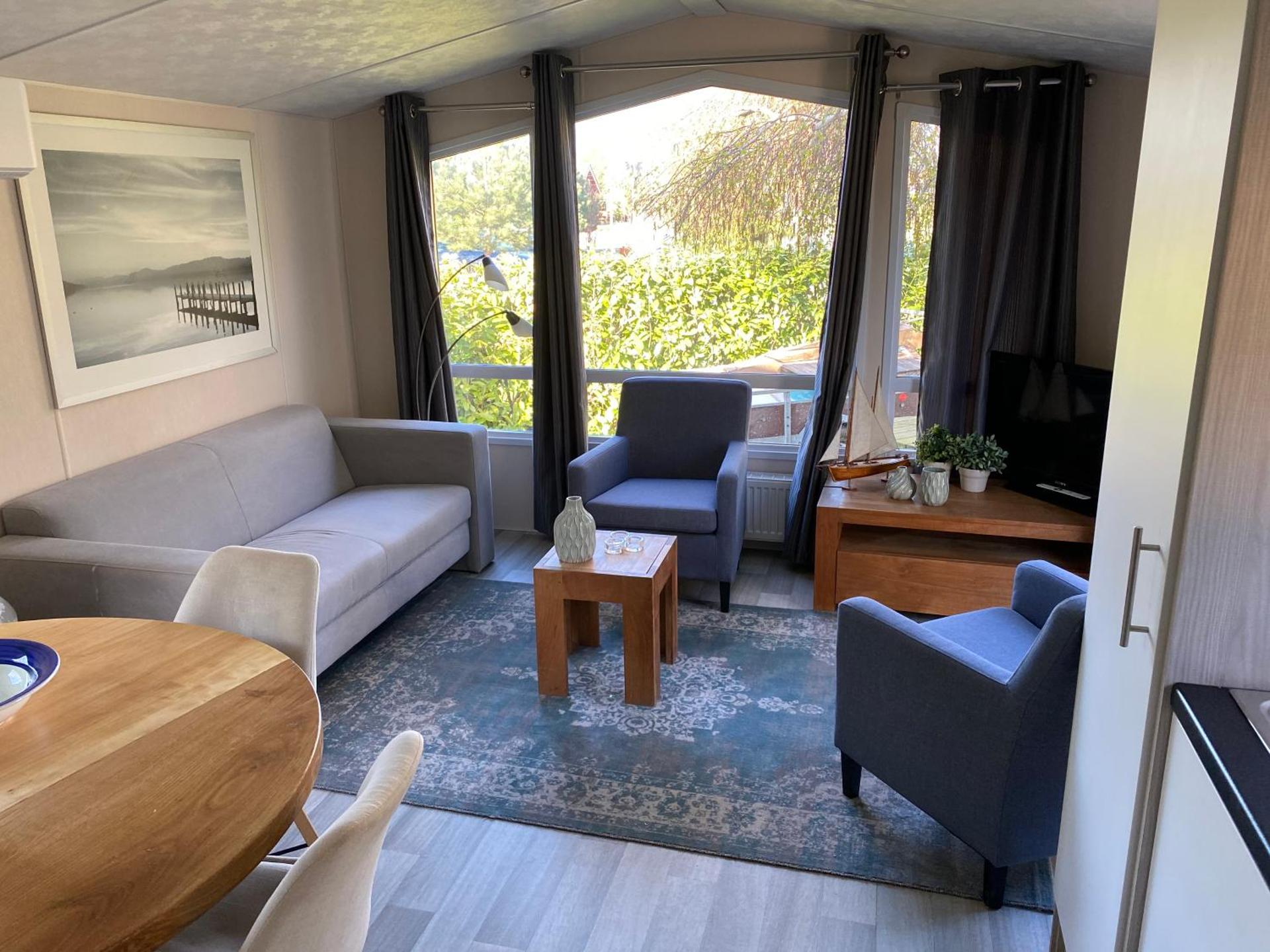 Mooi chalet in havenplaatsje op fietsafstand van het strand bij Ouddorp