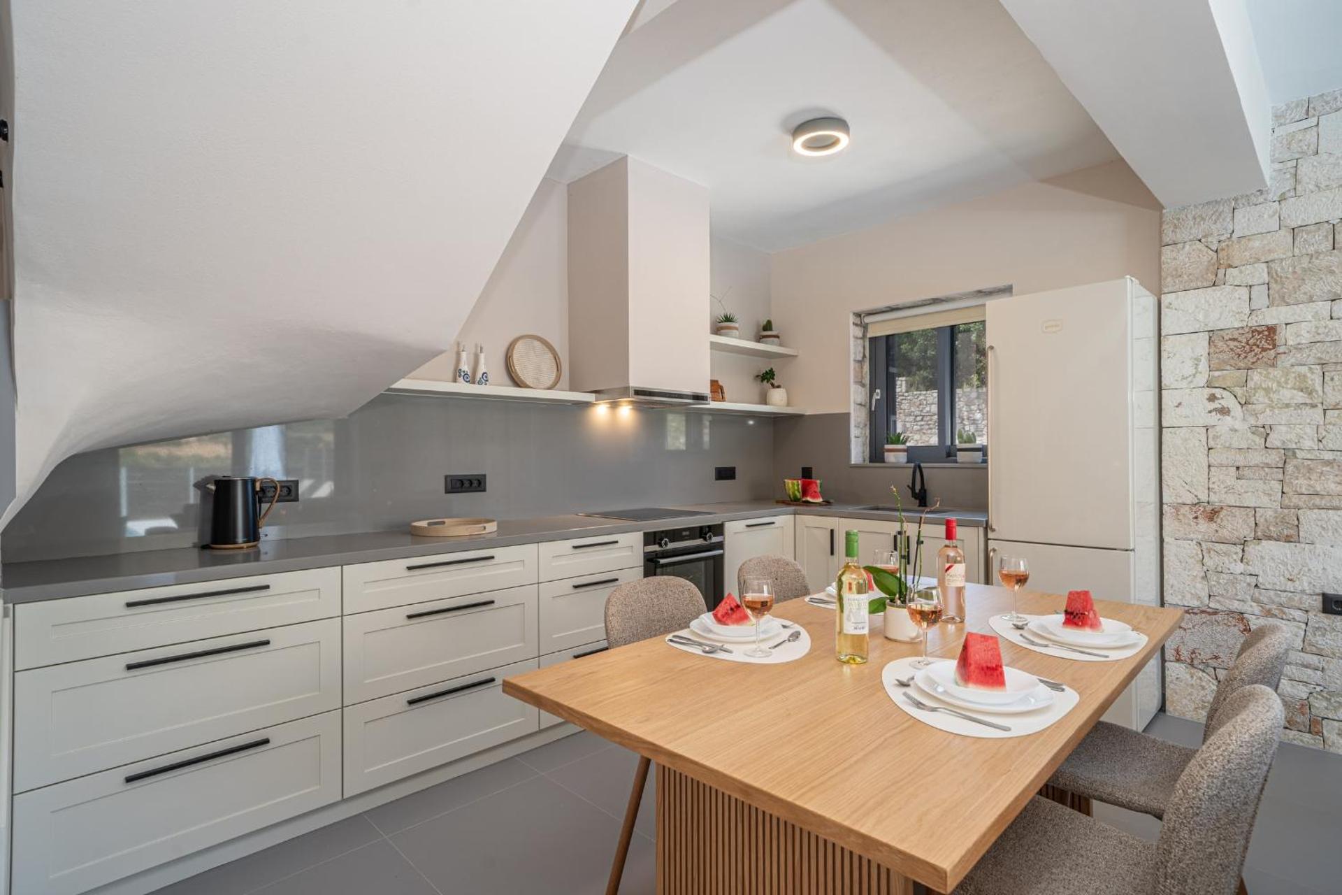 Luxury Stone Villa Aris, ideally located just a 5-minute walk from restaurants and shops