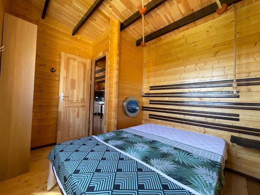 Casa em madeira com jardim privado