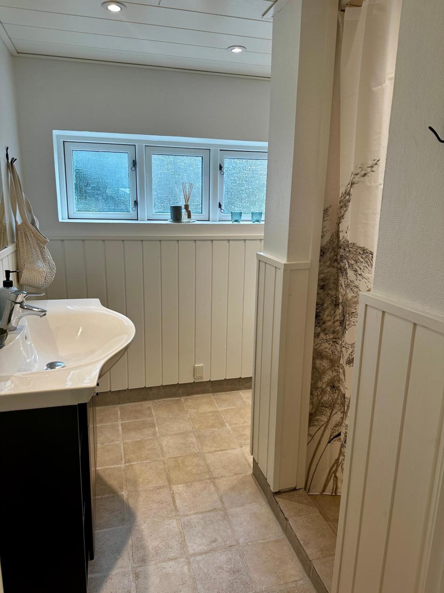 Skøn lejlighed med egen terrasse og have tæt på centrum i Skagen