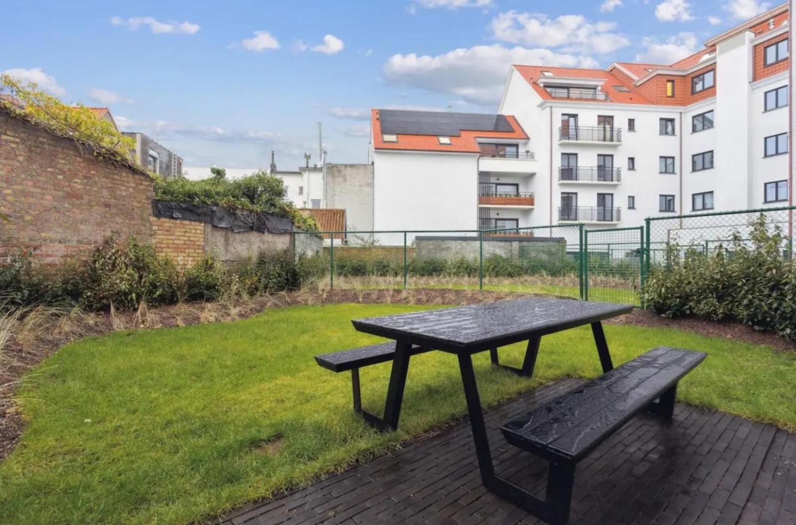 Triton luxe gelijkvloers appartement met tuin en gratis garage