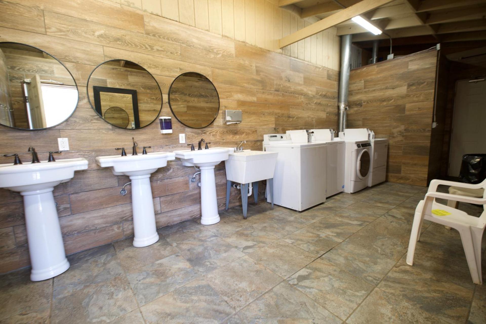 Tent with camp style central bathrooms