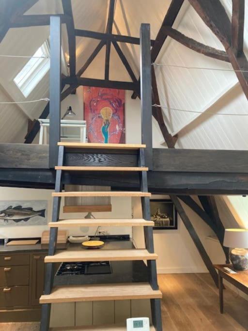 Hoogwaardig afgewerkt loft in oude stadscentrum