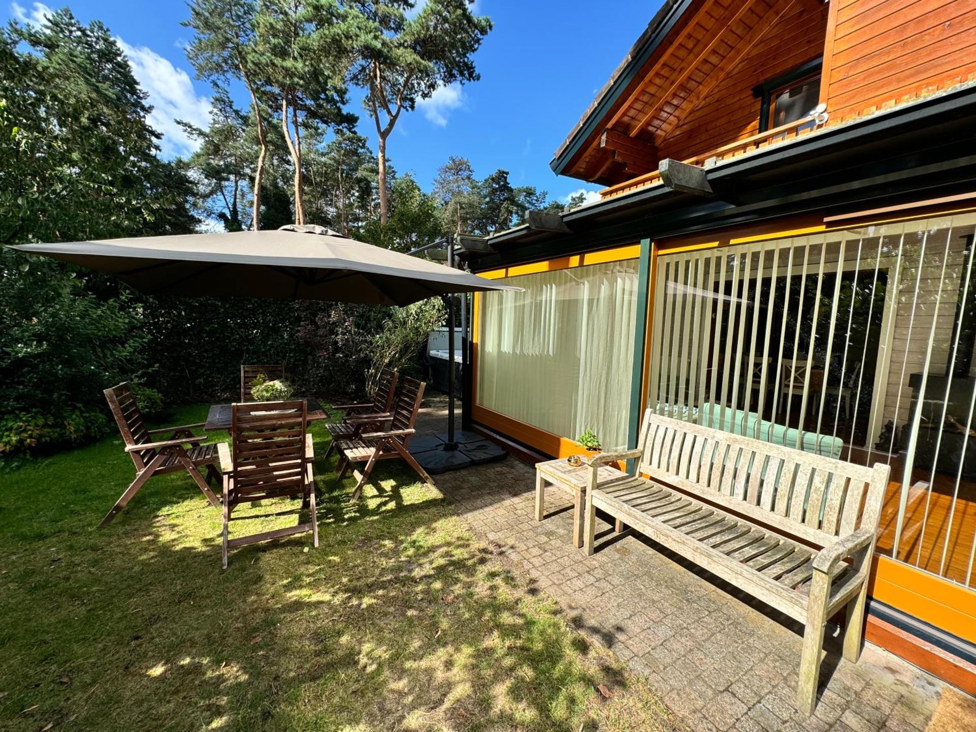 Houten chalet/bungalow in het bos, sauna, jacuzzi