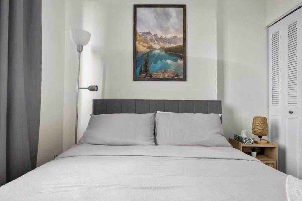 Downtown Near Rogers Place with Covered Parking, Sleeps 6, Pool Table, Sauna, Gym, Two Bedrooms & More