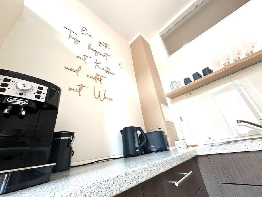 Classy City-Apartment - Netflix-Parkplatz-Balkon-Zentrum-BTU-Kaffeevollautomat