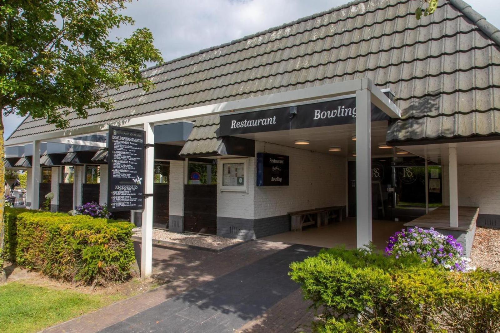 Welcome in - Strandhuis Schoneveld, zonnige en ruime tuin met speeltoestel