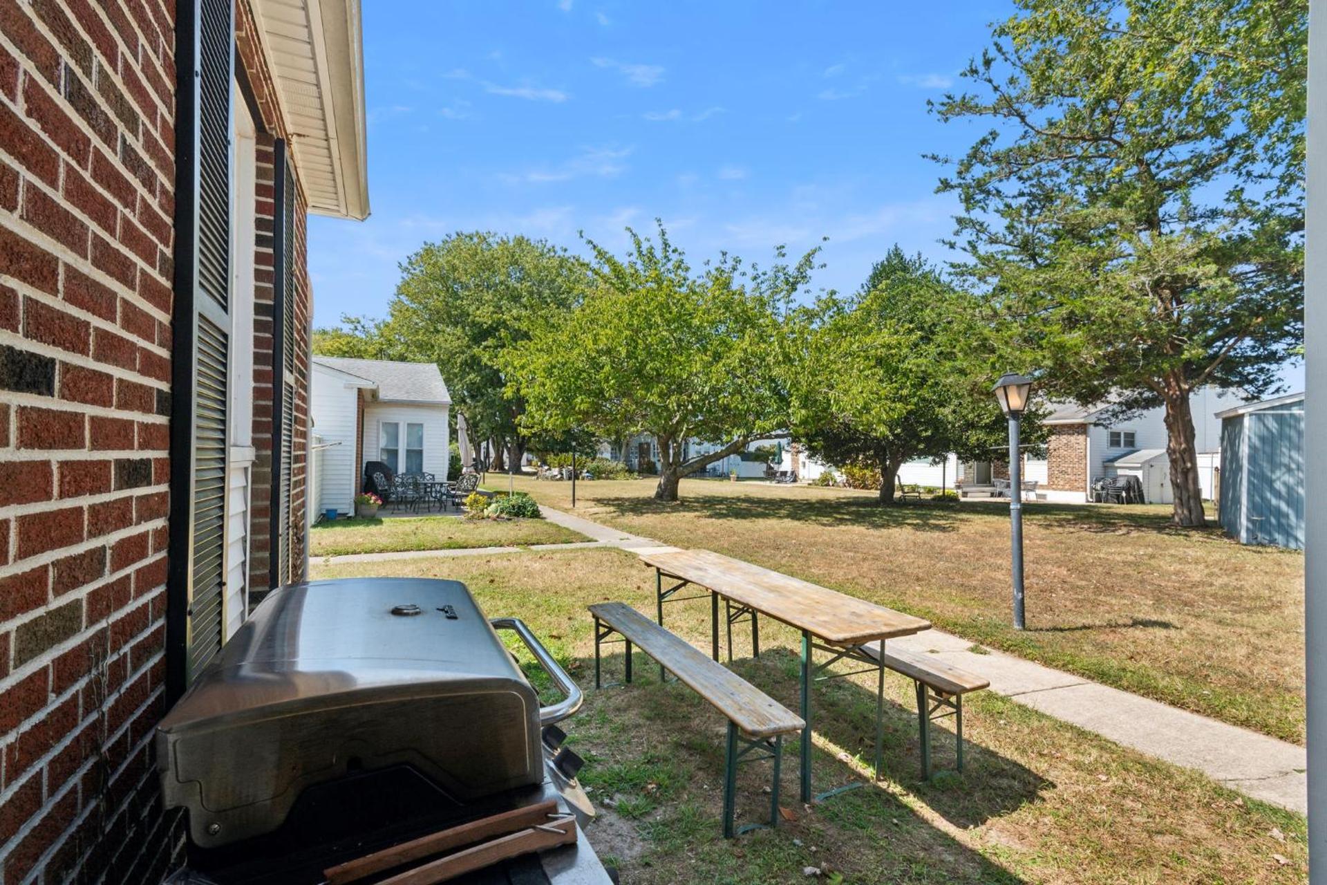 Cozy 2BR Condo - Beachside Bliss with Yard Space condo