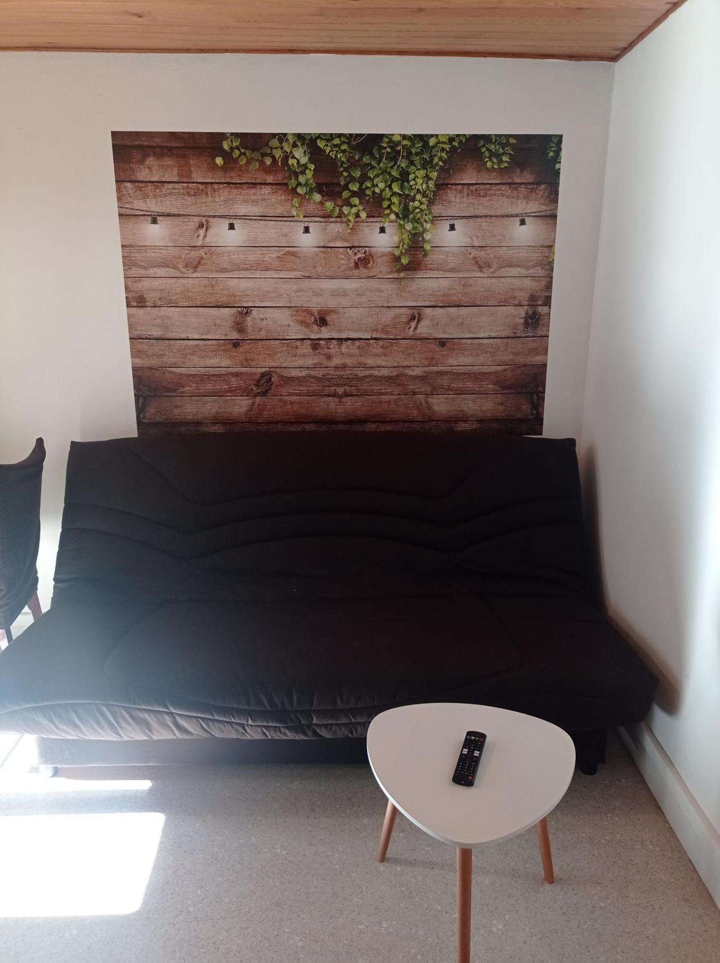 Appartement cosy avec son charme ancien.