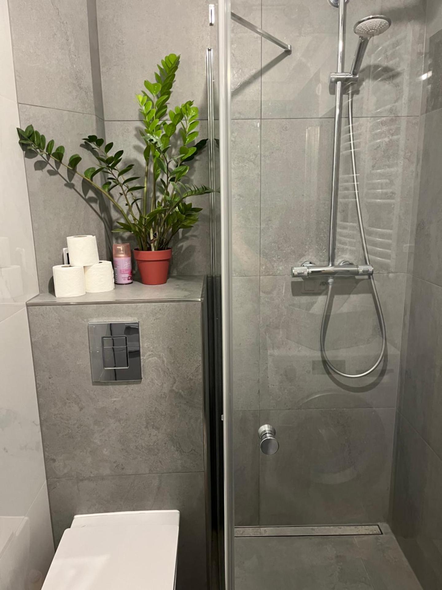 Apartament przy Parku Czartoryskich II - Faktury VAT - parking