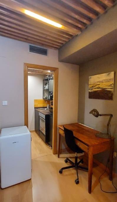 Estudio de diseño con parking en el centro