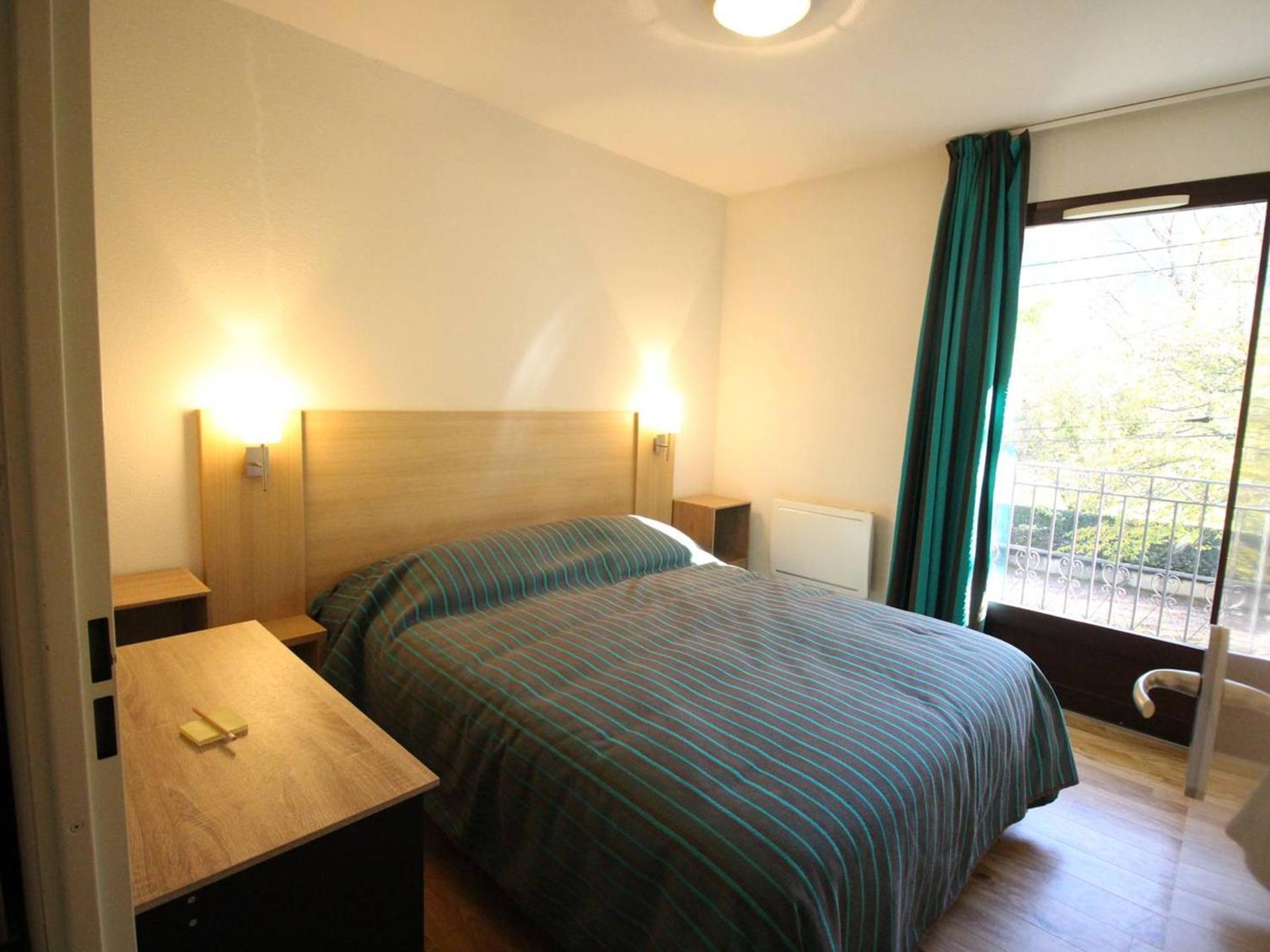 Charmant T2 avec balcon, parking et lave-linge près du parc - FR-1-313-235