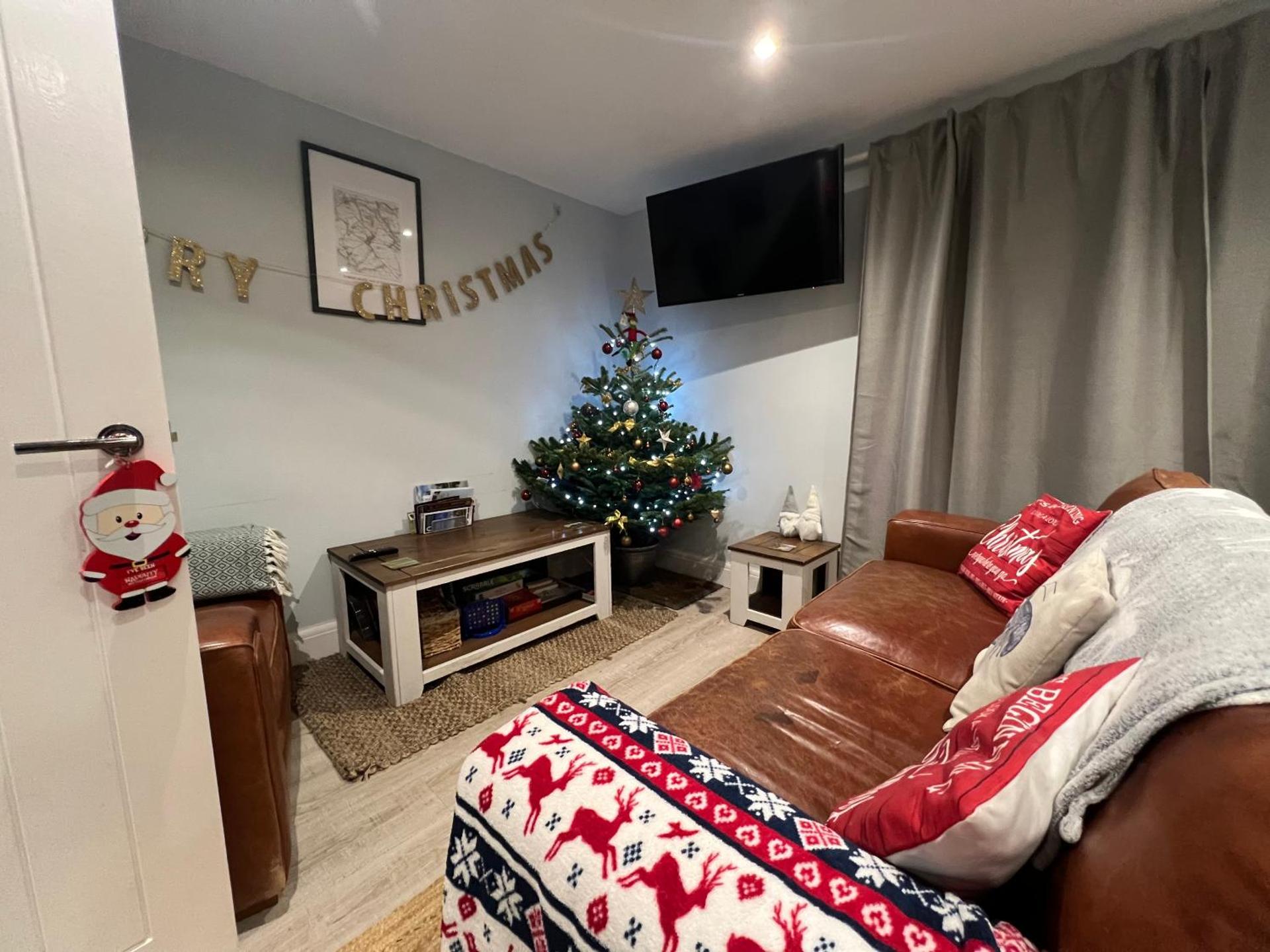 Orchard Lodge -Coastal Retreat, new build, village views, private garden and terrace