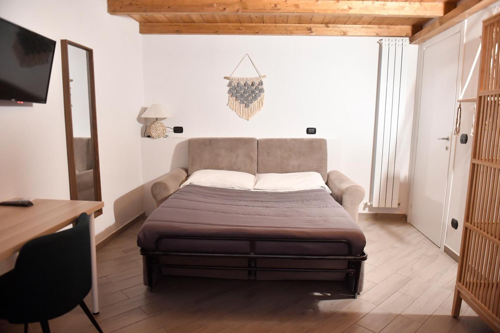 Quadruple Room with Private Bathroom