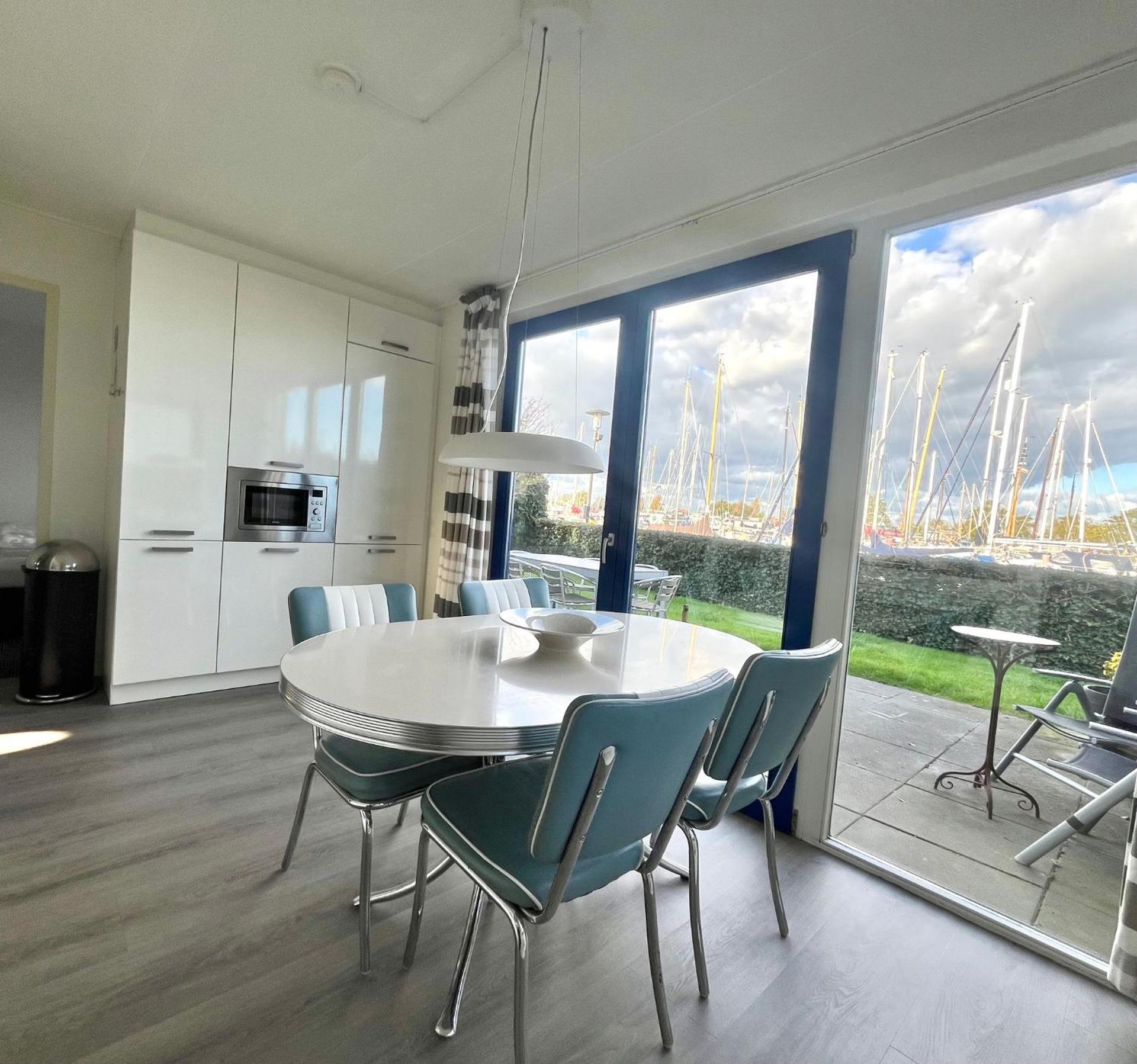 6pers Modern harbor house Jasmijn with fenced garden and lake view