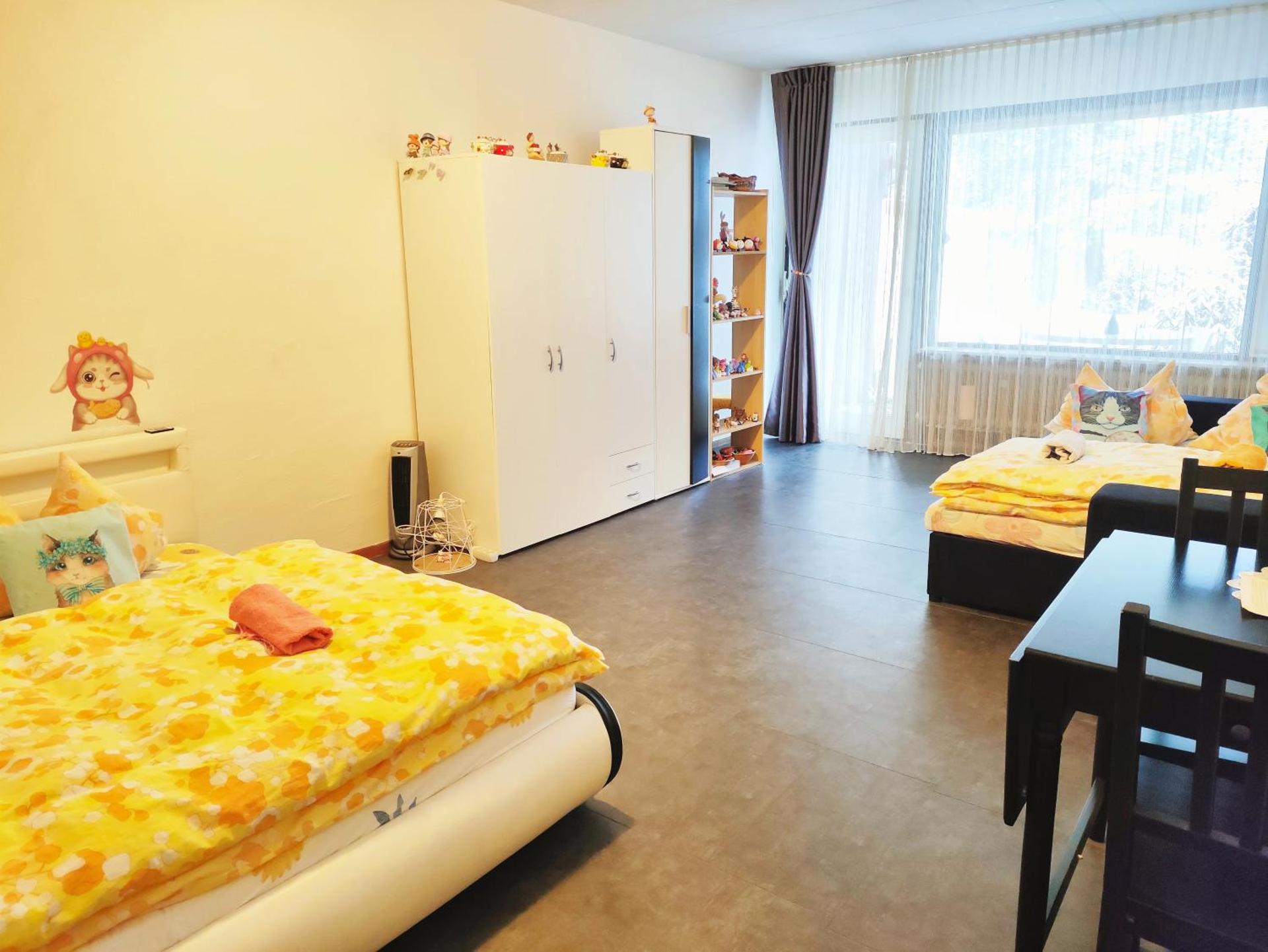 Ferienwohnung Schöne Wohnung 2d-Gebäude mit Mini-garten