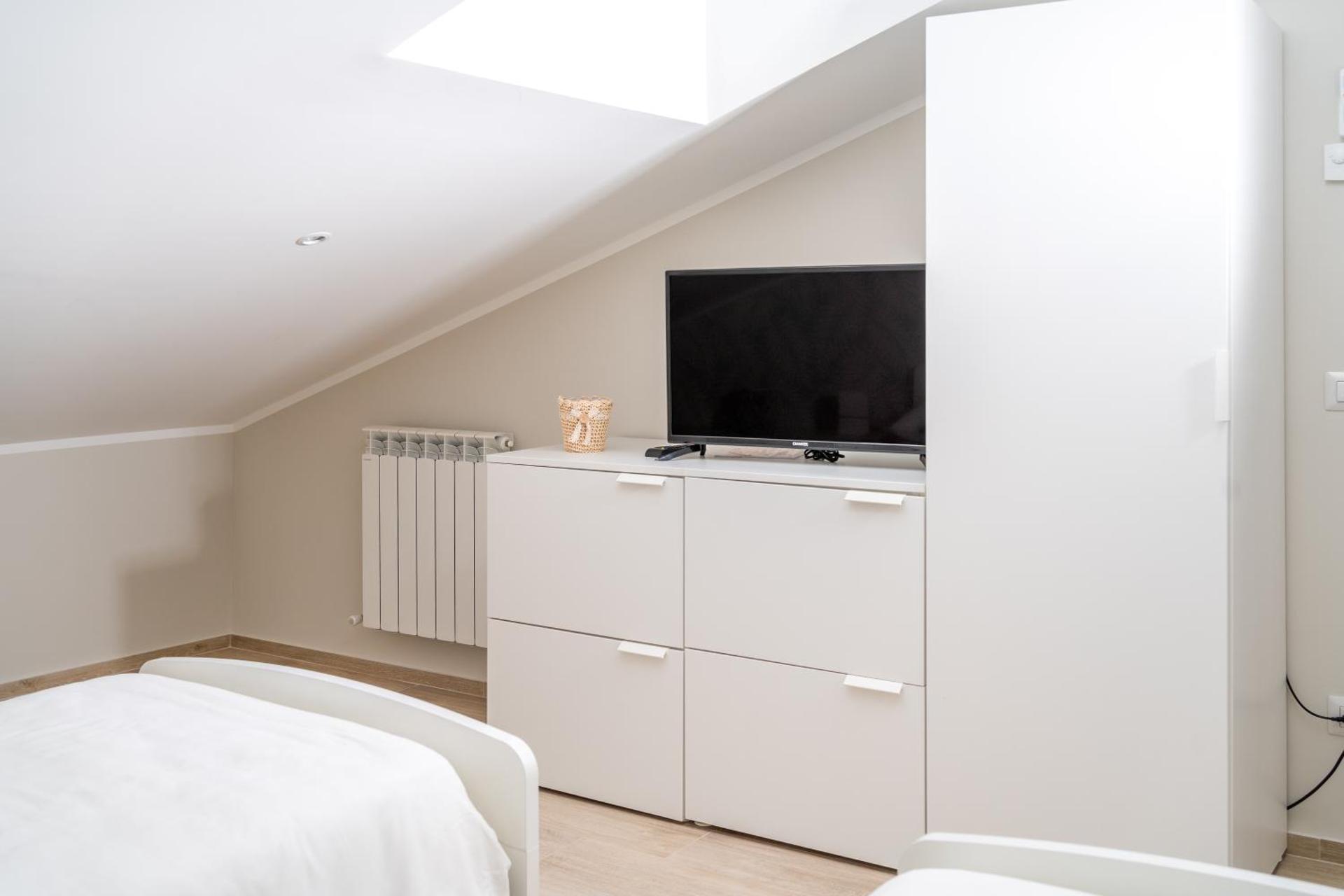 Otium Rooms / Camere e Appartamenti