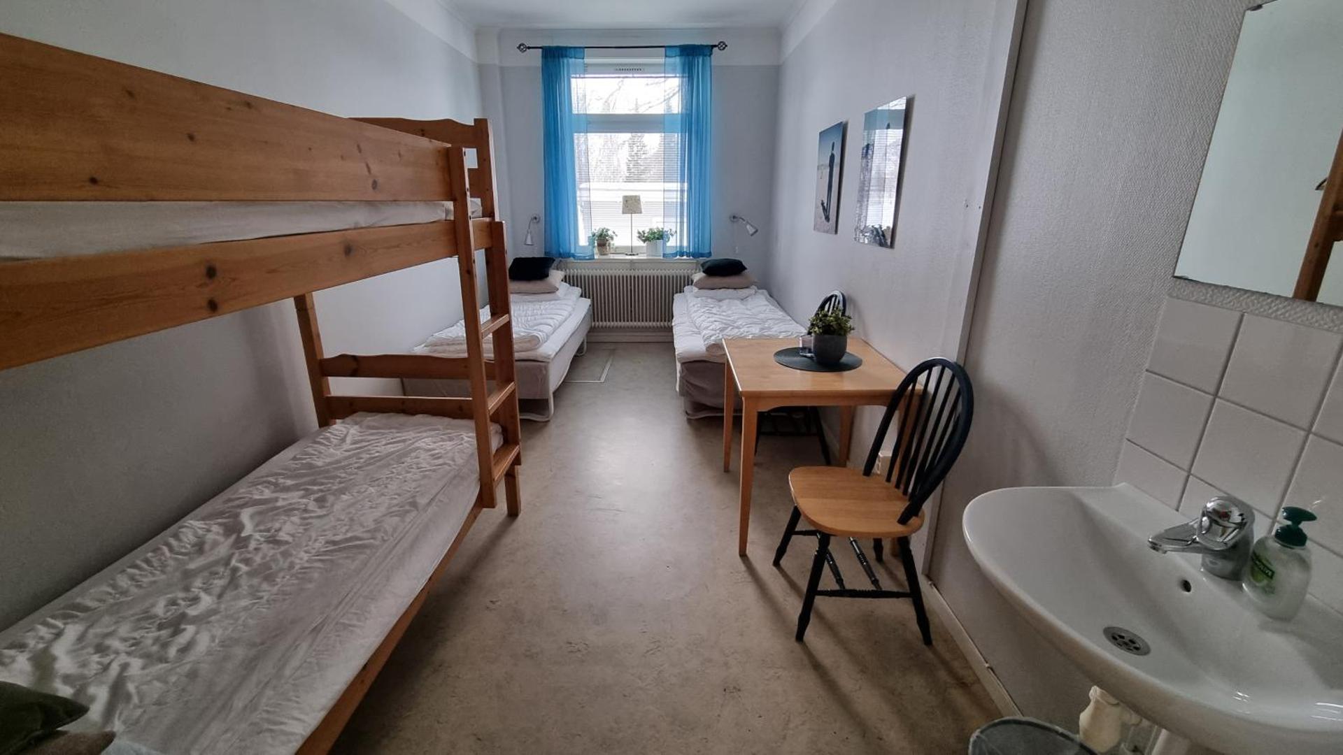 Quadruple Room with Shared Bathroom