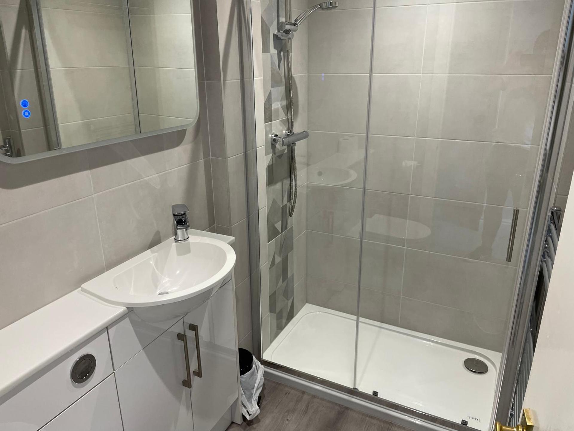 Kamer met Queensize Bed en Uitzicht op Zee