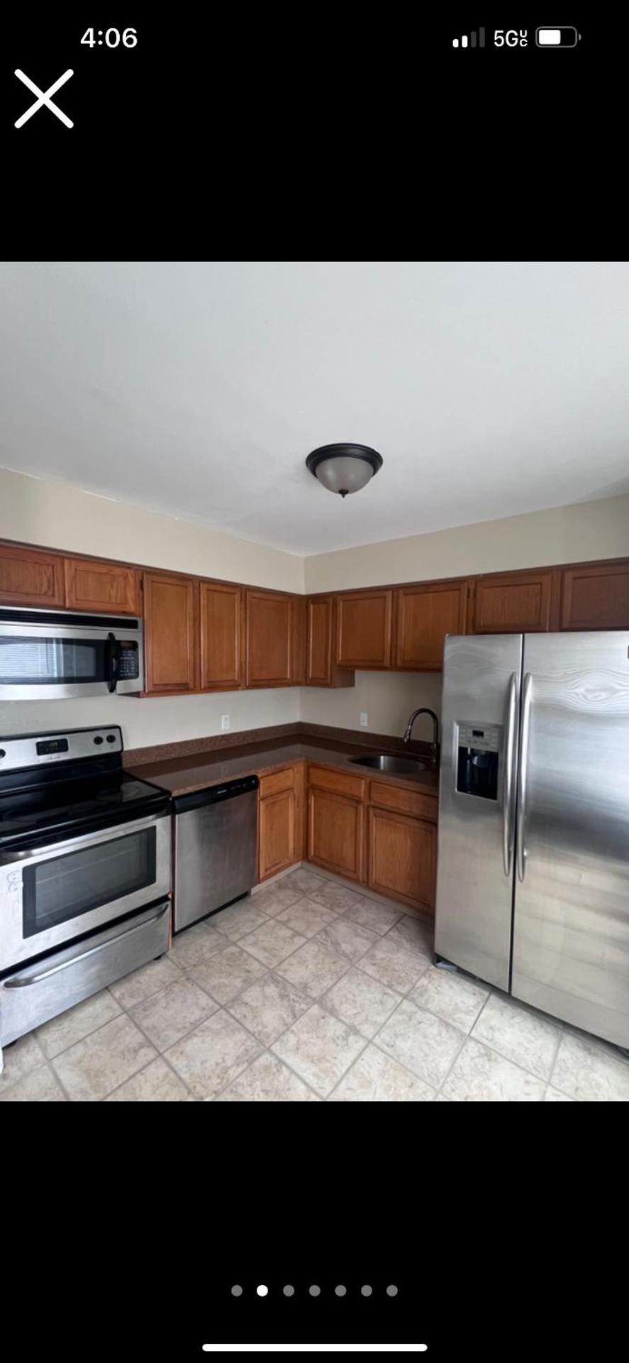 Charming Town home Located in A Quiet Neighborhood