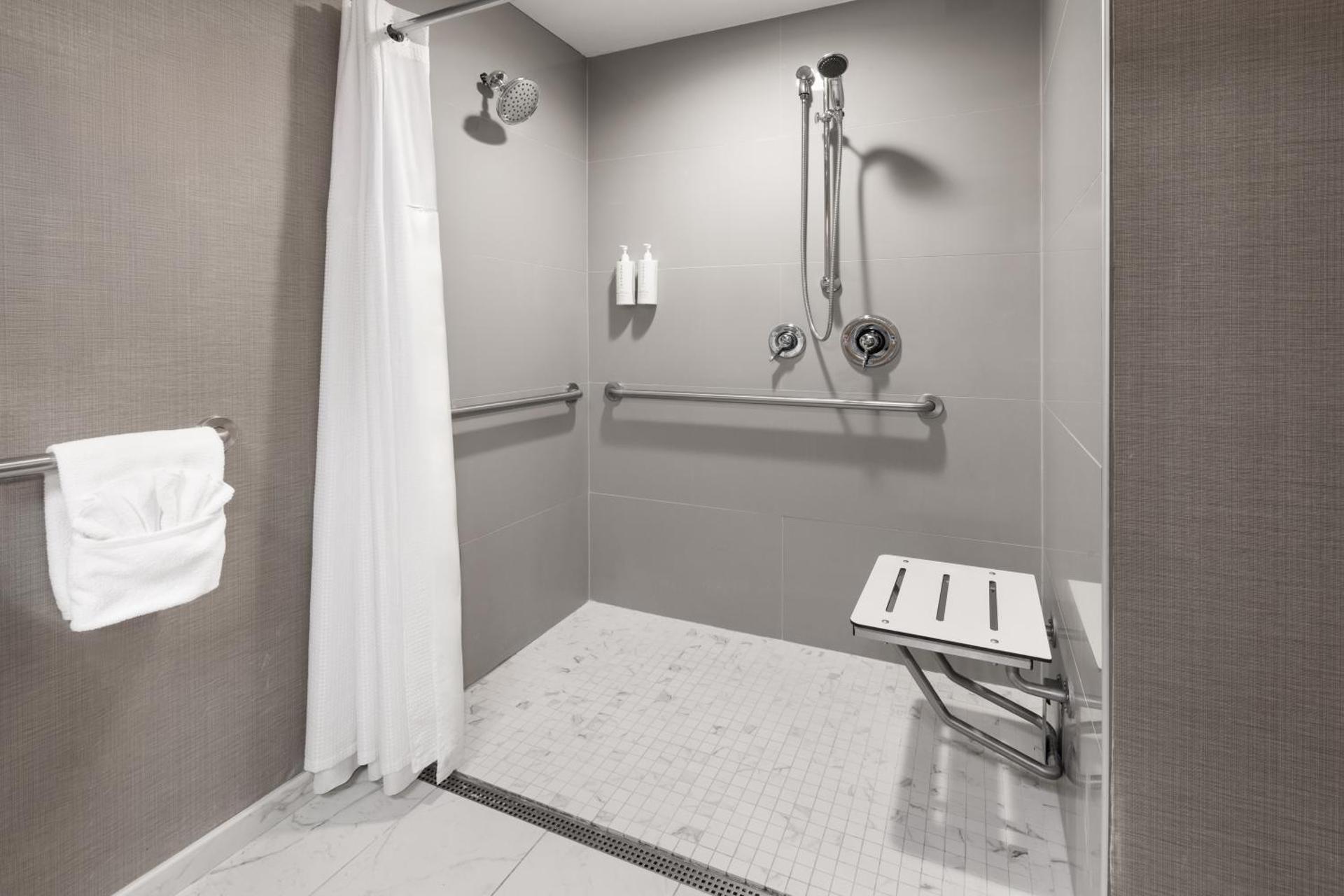 King Room with Roll-In Shower and Patio - Mobility/Hearing Access - Non-Smoking