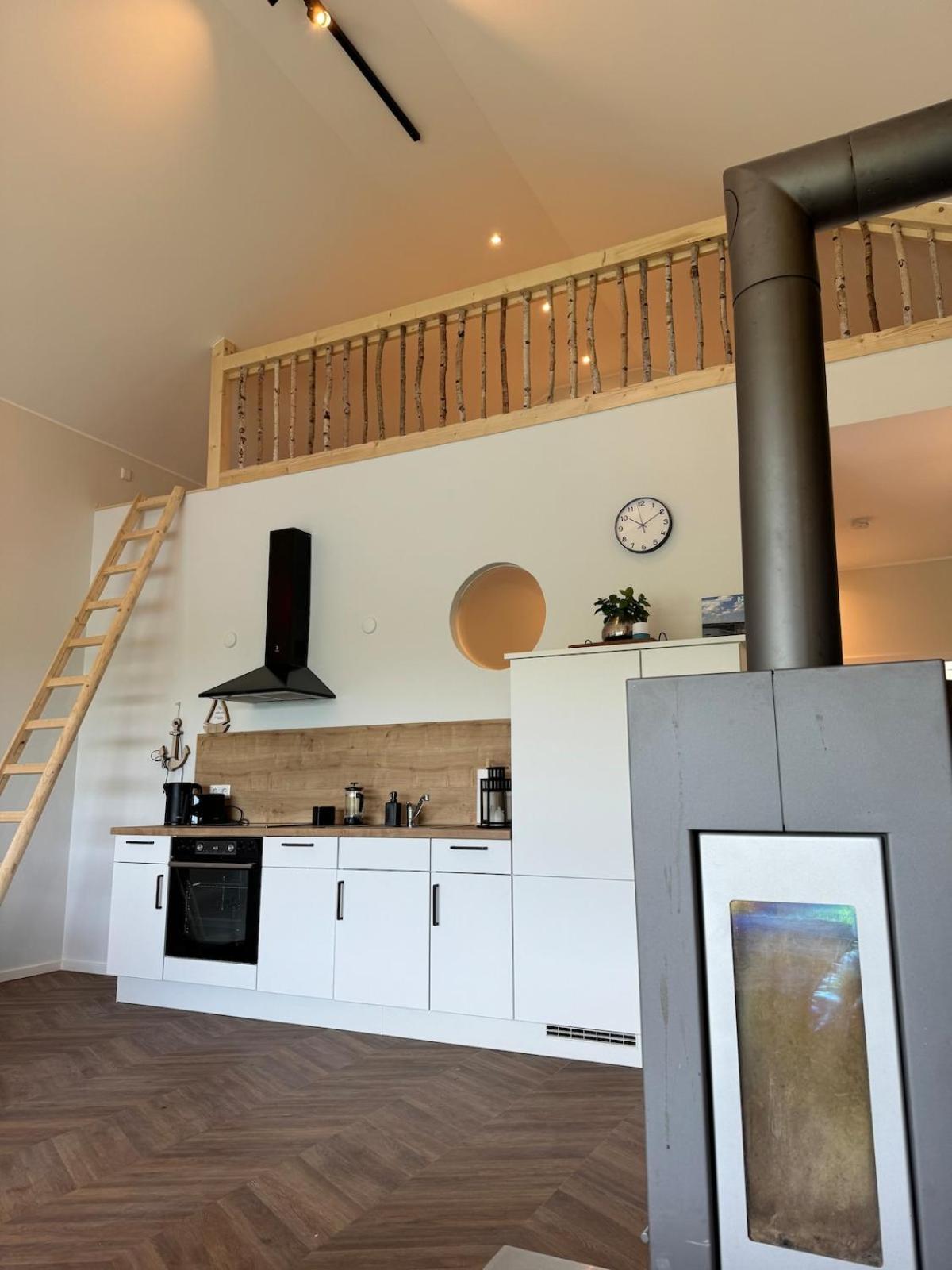 #5 Ommi Kese STAR Suite Kamin Balkon Seeblick