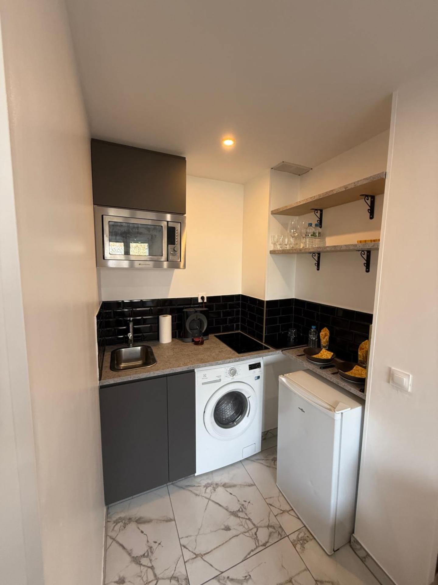 CHARMANTE STUDIO PROCHE PARIs