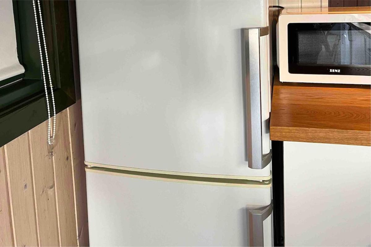 Veludstyret sommerhus i unik natur 350 m fra lækker badestrand - helårsbolig