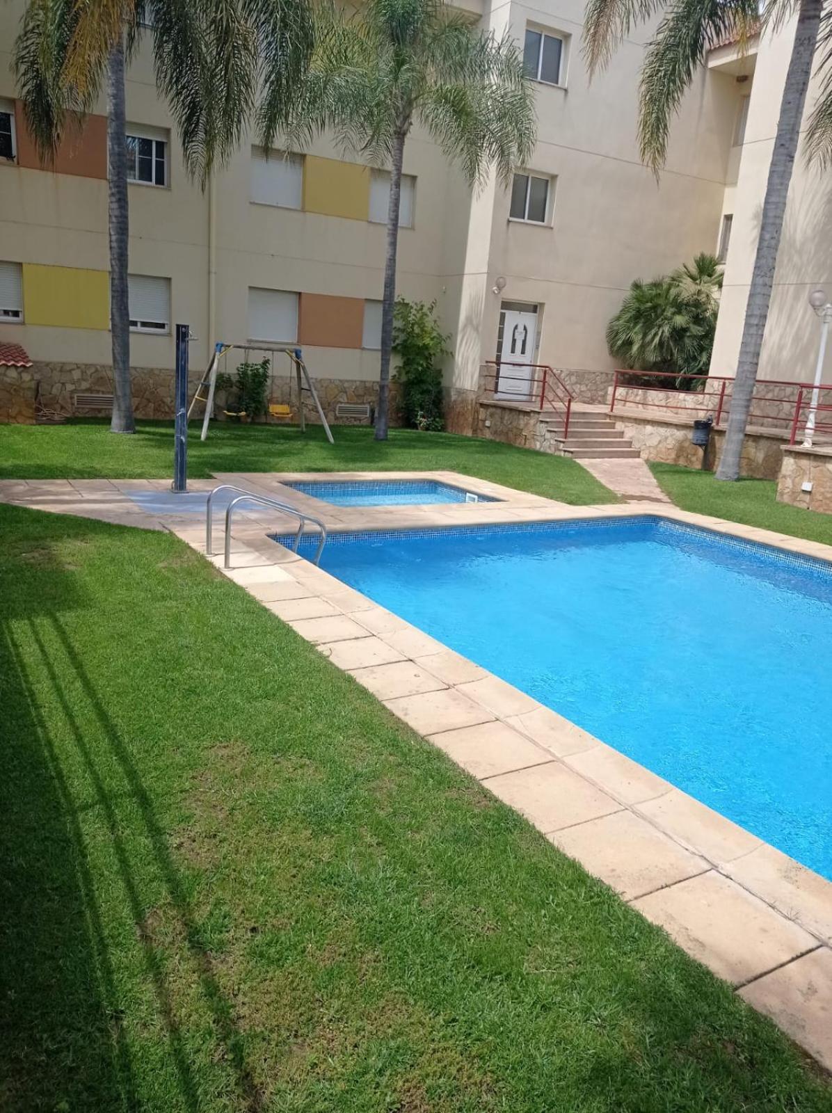 apartamento con piscina