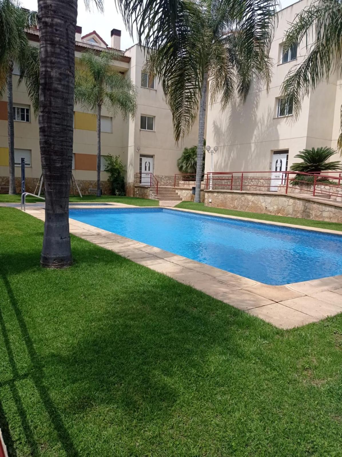 apartamento con piscina