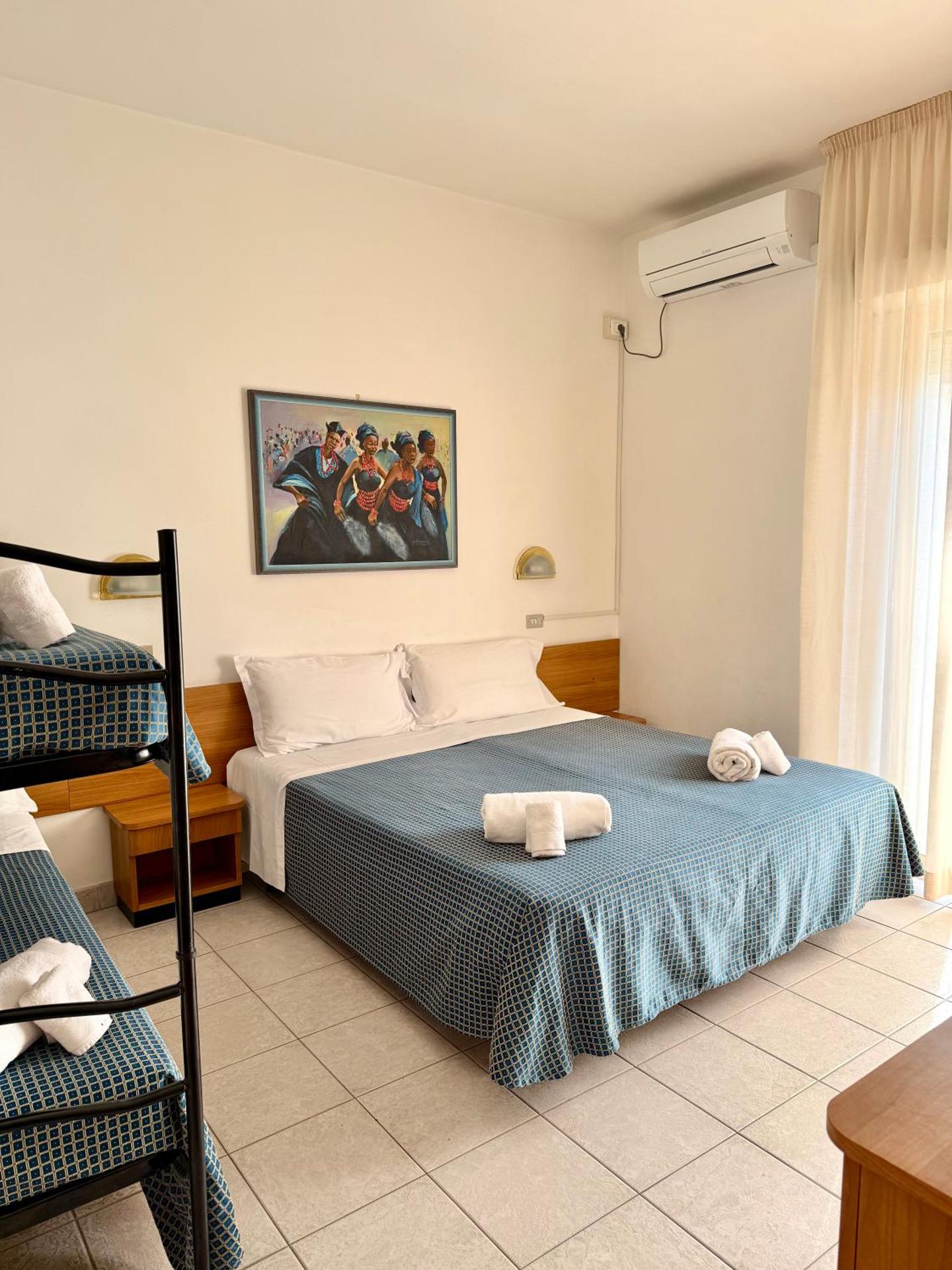 Deluxe Quadruple Room with Sided Sea View