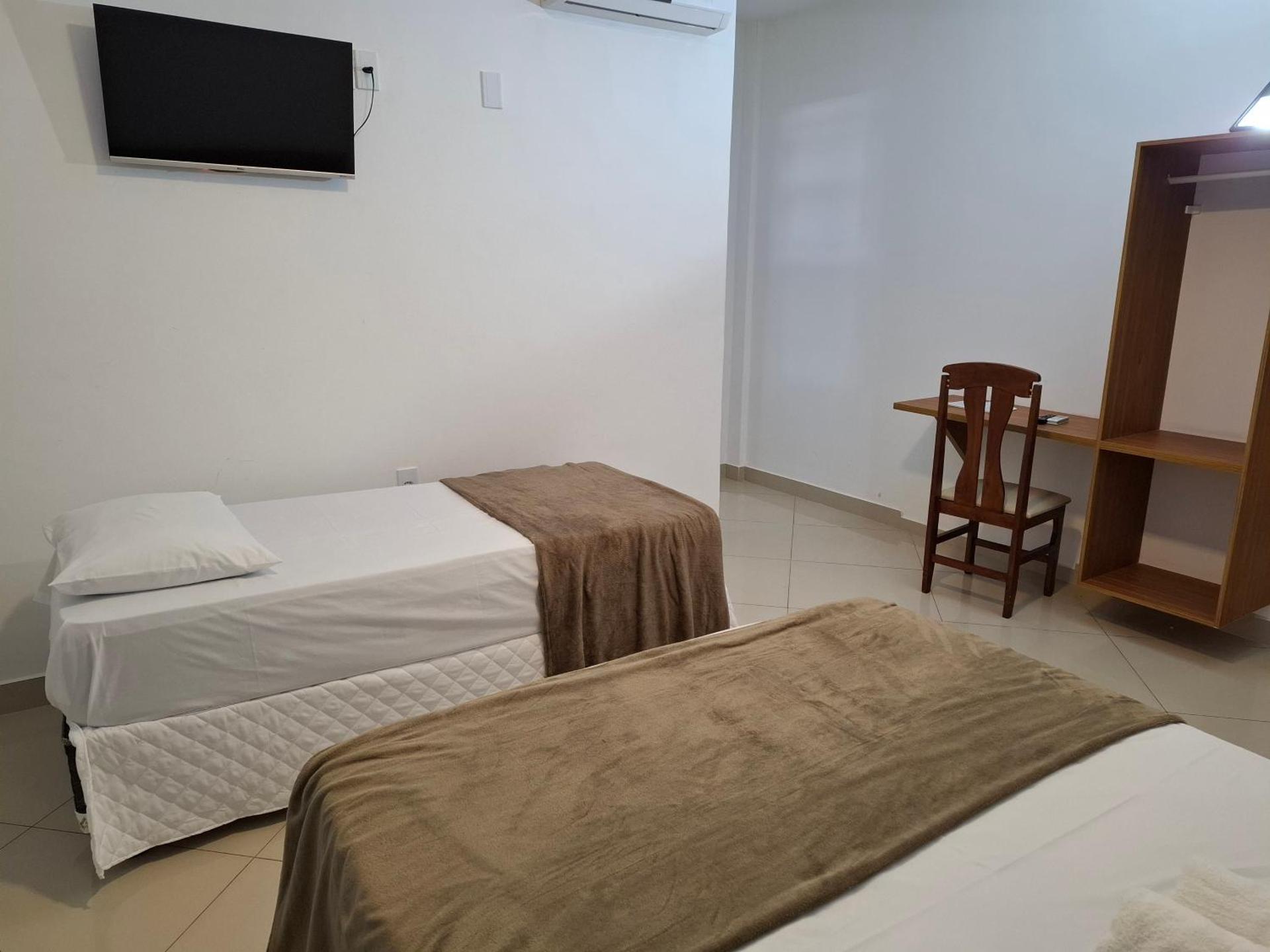 Camera Quadrupla Superior