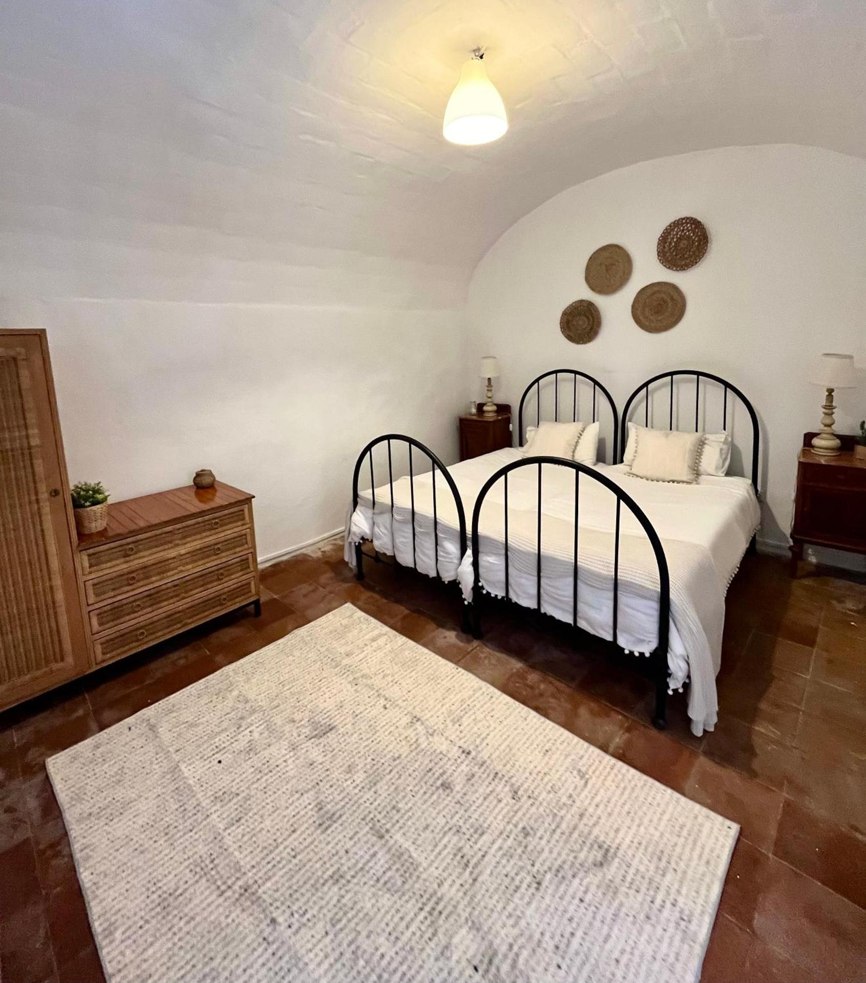 Casa con jardín y barbacoa