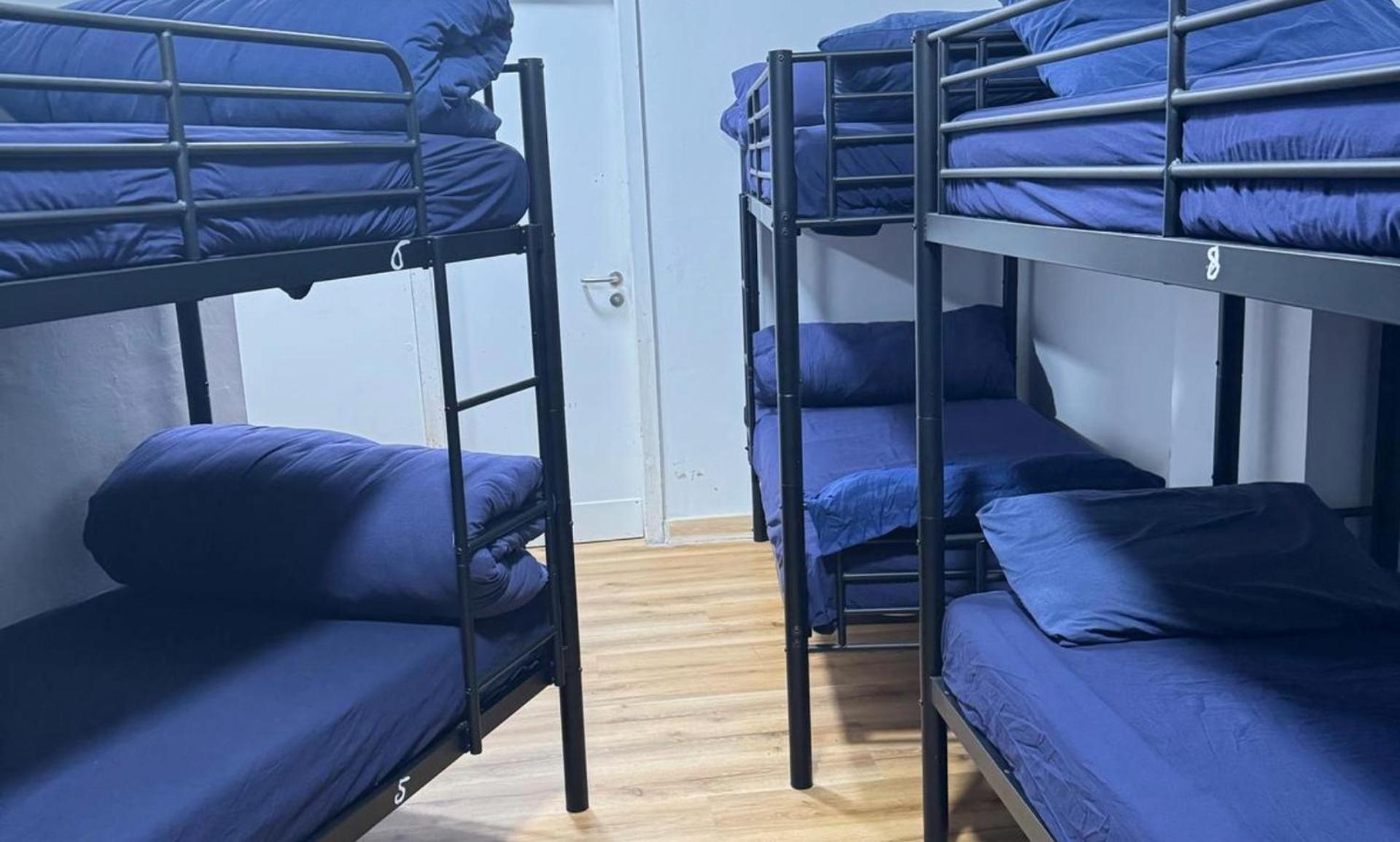 Bed in 12-Bed Male Dormitory Room
