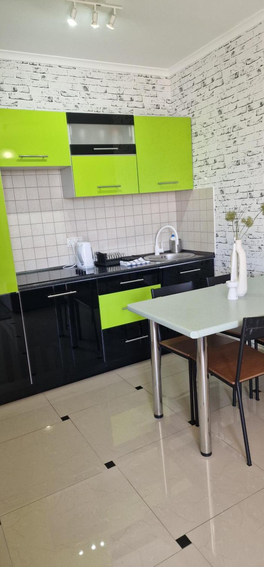 One-Bedroom Apartment with Balcony and Garden View