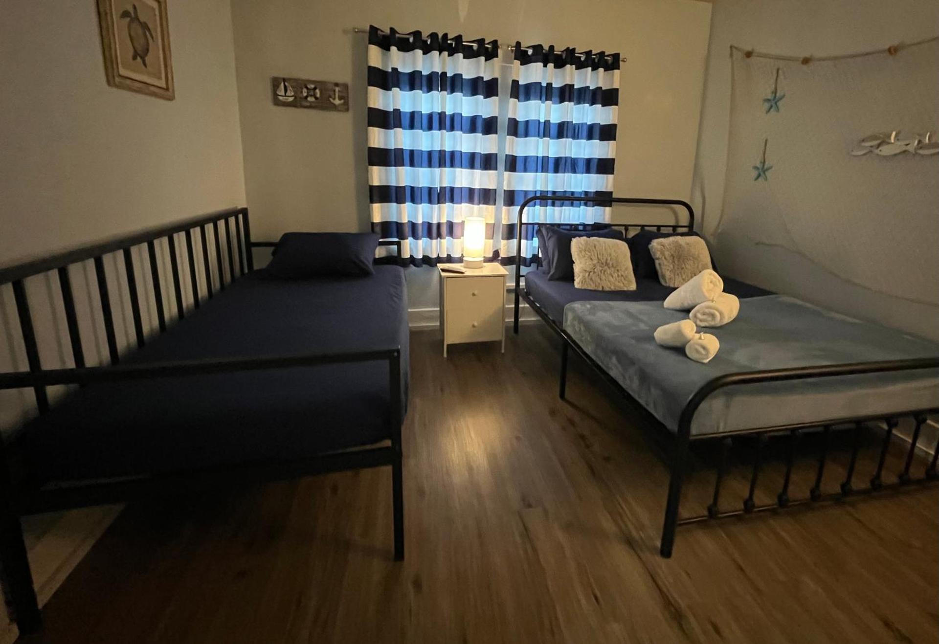 Economy Triple Room with Shared Bathroom