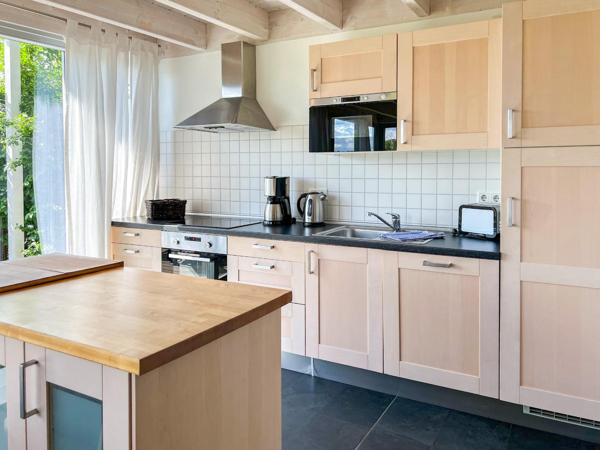 Ferienhaus Wiesengeflüster S1 - mit Sauna, Kamin und Workation an der Müritz