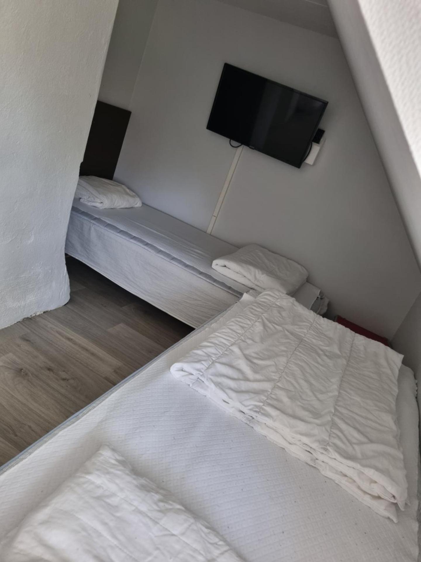 Quadruple Room with Shared Bathroom