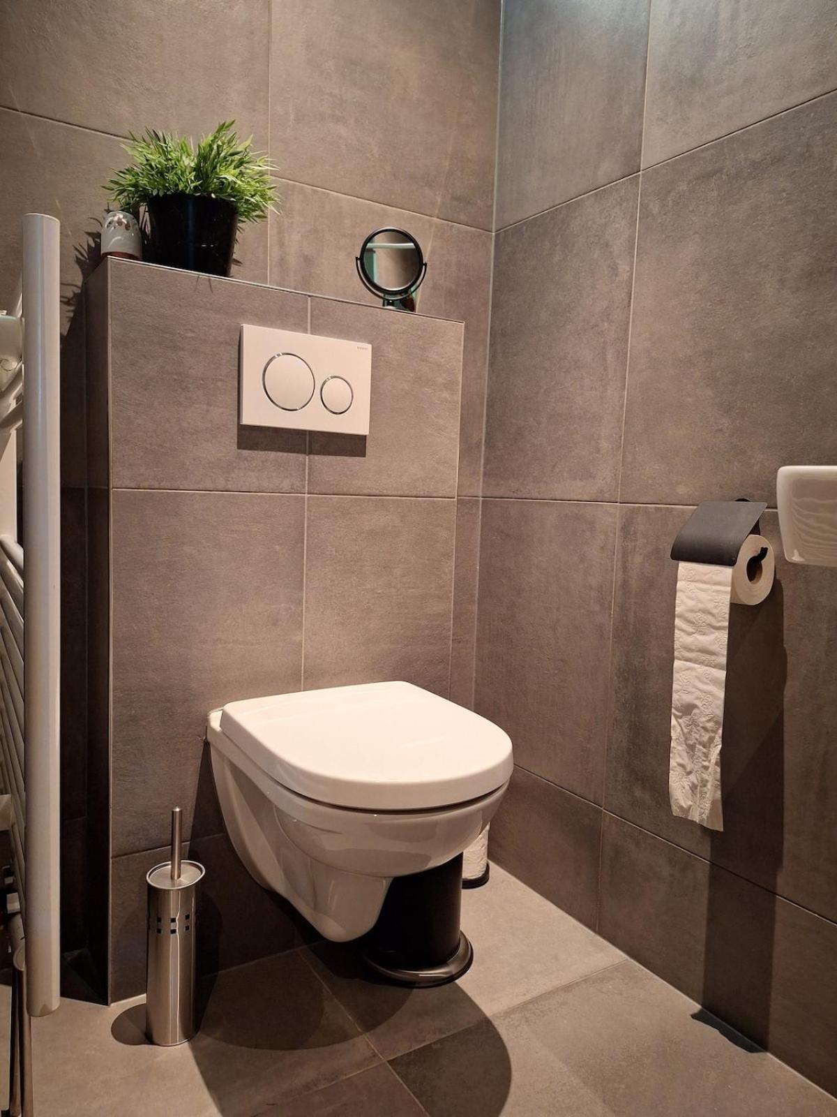 Bosnest De Specht, een knus boshuisje met privetuin in Otterlo nabij Veluwepark